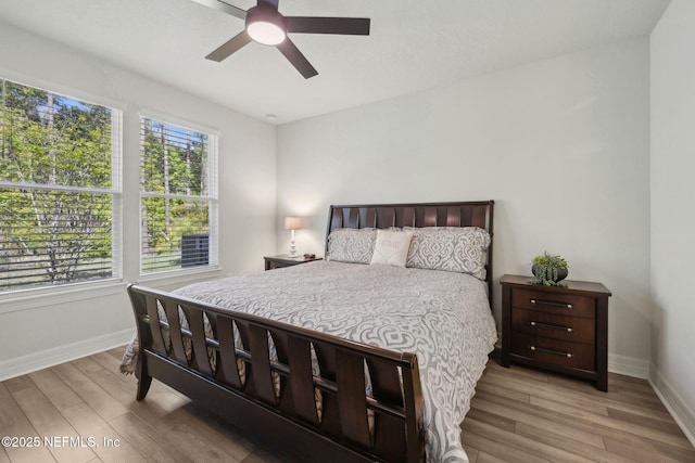 83 Woodgate Dr, Ponte Vedra, FL 32081 - bedroom with ceiling fan, baseboards, and wood finished floors