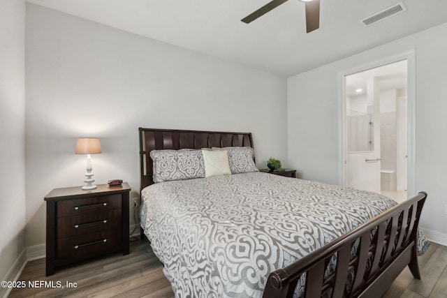 83 Woodgate Dr, Ponte Vedra, FL 32081 - bedroom featuring visible vents, baseboards, ensuite bath, and wood finished floors
