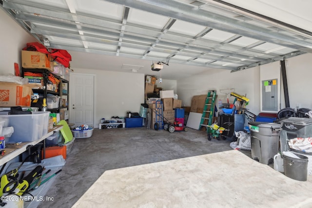 83 Woodgate Dr, Ponte Vedra, FL 32081 - garage featuring electric panel and a garage door opener