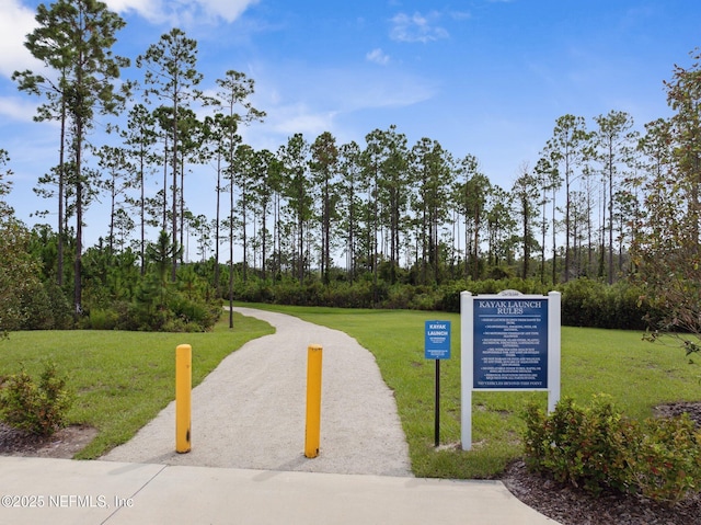 83 Woodgate Dr, Ponte Vedra, FL 32081 - surrounding community featuring a lawn