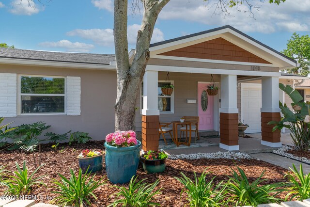 1018 14th Ave N, Jacksonville Beach, FL 32250 - view of front of home with a porch