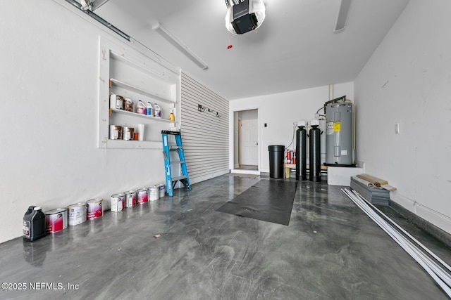1018 14th Ave N, Jacksonville Beach, FL 32250 - garage featuring water heater and a garage door opener