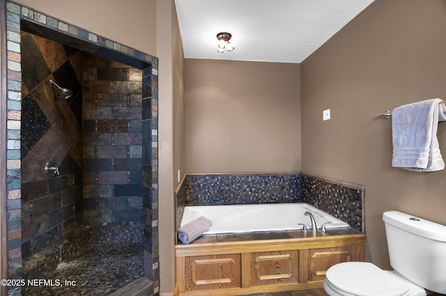 full bath featuring a bath, a tile shower, and toilet