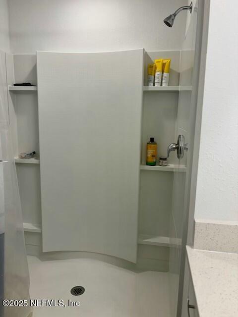 full bath with a stall shower