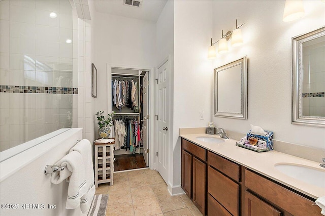 225 Garden Wood Dr, Ponte Vedra, FL 32081 - full bathroom with a sink, visible vents, walk in shower, and double vanity