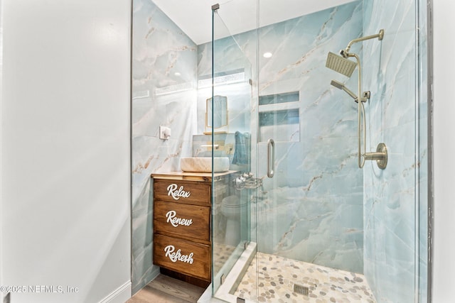 8871 Manson Cir, Jacksonville, FL 32220 - bathroom featuring vanity and a marble finish shower