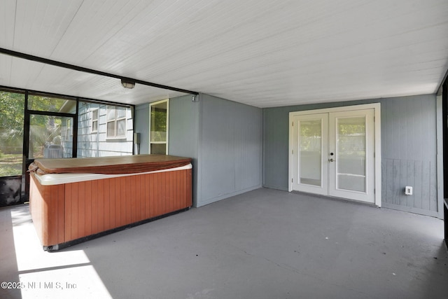 7427 Warner Dr, Jacksonville, FL 32244 - unfurnished sunroom featuring french doors and a jacuzzi