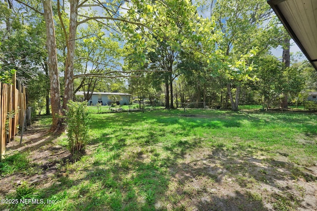 7427 Warner Dr, Jacksonville, FL 32244 - view of yard featuring fence