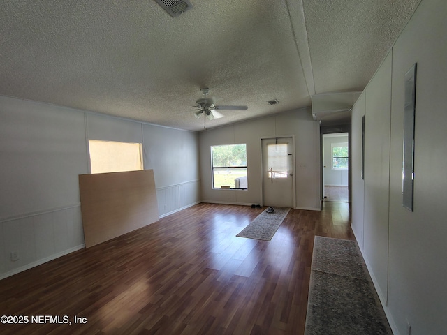 217 Pineway W Ave, Satsuma, FL 32189 - entrance foyer featuring healthy amount of natural light, ceiling fan, wood finished floors, a textured ceiling, and vaulted ceiling