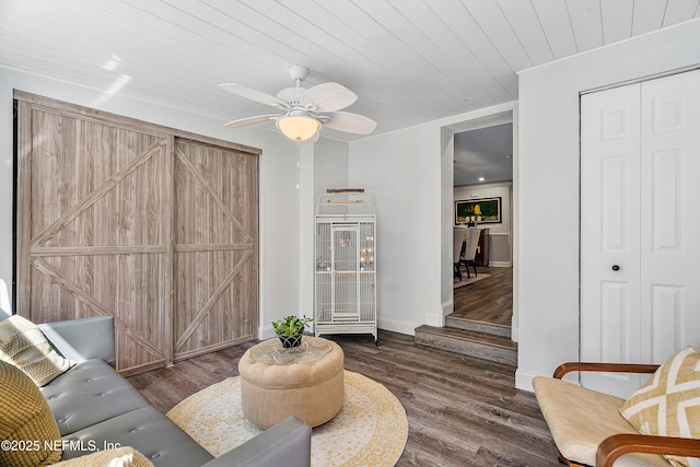 9 Blare Dr, Palm Coast, FL 32137 - living area with wood finished floors, baseboards, a ceiling fan, and wooden ceiling