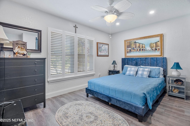 9 Blare Dr, Palm Coast, FL 32137 - bedroom featuring recessed lighting, ceiling fan, baseboards, and wood finished floors
