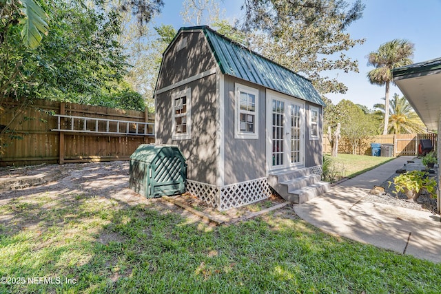 9 Blare Dr, Palm Coast, FL 32137 - view of outbuilding featuring entry steps, a fenced backyard, and an outbuilding