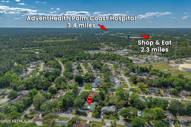 9 Blare Dr, Palm Coast, FL 32137 - birds eye view of property featuring a view of trees and a residential view