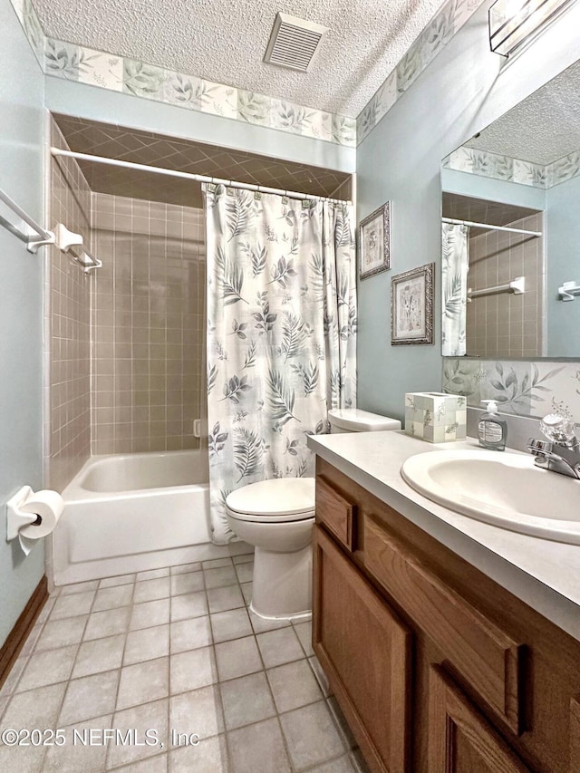 bathroom with visible vents, shower / bath combo with shower curtain, toilet, tile patterned floors, and vanity