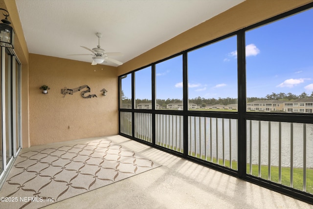 11929 Surfbird Cir Unit 12F, Jacksonville, FL 32256 - unfurnished sunroom featuring a residential view and a water view