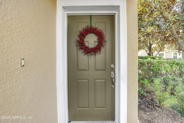 11929 Surfbird Cir Unit 12F, Jacksonville, FL 32256 - property entrance featuring stucco siding