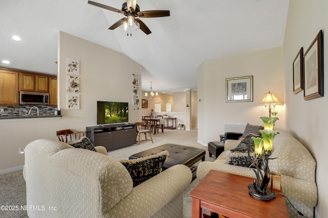 11929 Surfbird Cir Unit 12F, Jacksonville, FL 32256 - living room featuring ceiling fan with notable chandelier, visible vents, recessed lighting, carpet flooring, and lofted ceiling