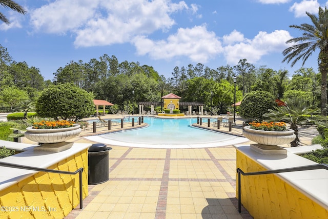 11929 Surfbird Cir Unit 12F, Jacksonville, FL 32256 - community pool featuring a patio area