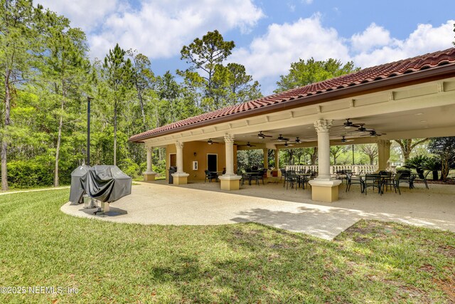 11929 Surfbird Cir Unit 12F, Jacksonville, FL 32256 - view of patio / terrace featuring a grill and ceiling fan
