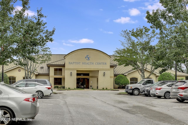 11929 Surfbird Cir Unit 12F, Jacksonville, FL 32256 - view of property with uncovered parking