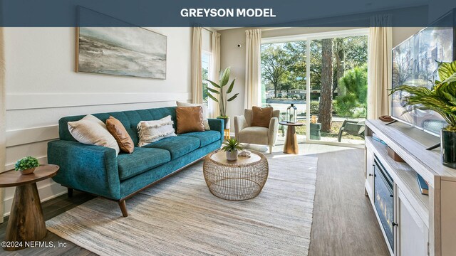 9926 Wyndbrook Ter, Jacksonville, FL 32210 - living area featuring wood finished floors