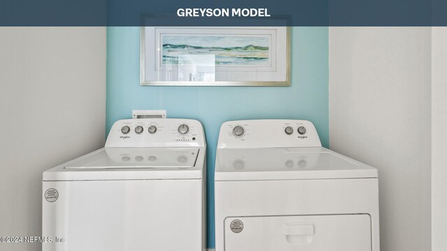 9926 Wyndbrook Ter, Jacksonville, FL 32210 - washroom featuring laundry area and washing machine and dryer