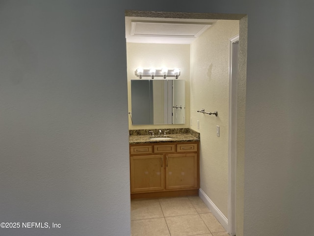 929 Seashell Ln, Ponte Vedra Beach, FL 32082 - bathroom with tile patterned floors, vanity, and a textured wall