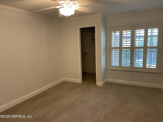 929 Seashell Ln, Ponte Vedra Beach, FL 32082 - unfurnished bedroom with baseboards, a spacious closet, carpet, a closet, and ornamental molding