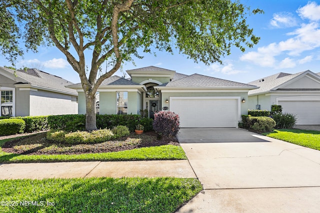 708 El Vergel Ln, Saint Augustine, FL 32080 - ranch-style house with concrete driveway, an attached garage, and stucco siding