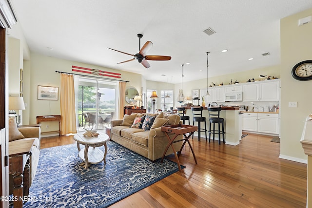 708 El Vergel Ln, Saint Augustine, FL 32080 - living room with visible vents, ceiling fan, recessed lighting, and hardwood / wood-style floors