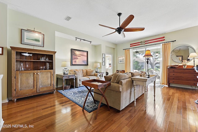 708 El Vergel Ln, Saint Augustine, FL 32080 - living room featuring visible vents, ceiling fan, and hardwood / wood-style flooring