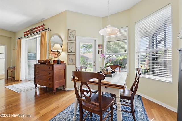 708 El Vergel Ln, Saint Augustine, FL 32080 - dining area featuring baseboards and light wood-type flooring
