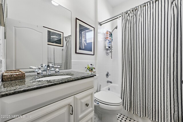 708 El Vergel Ln, Saint Augustine, FL 32080 - bathroom with toilet, shower / bath combo, and vanity