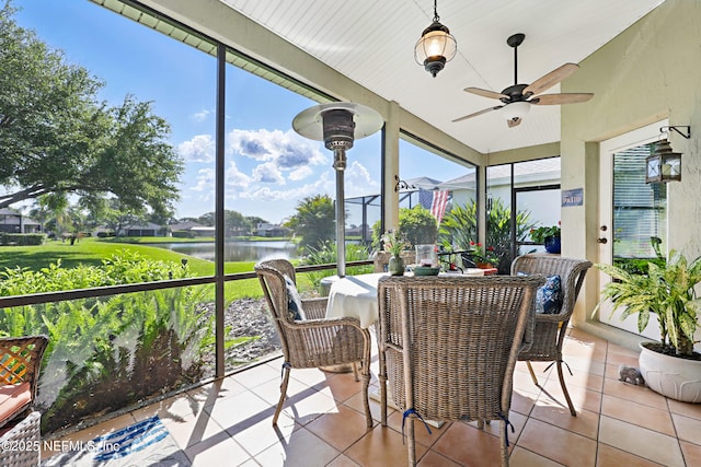 708 El Vergel Ln, Saint Augustine, FL 32080 - sunroom with a water view, tile patterned flooring, a healthy amount of sunlight, and ceiling fan