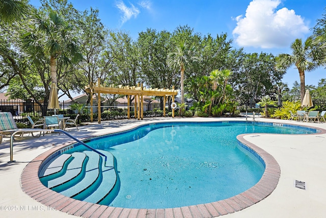 708 El Vergel Ln, Saint Augustine, FL 32080 - community pool with a patio and fence