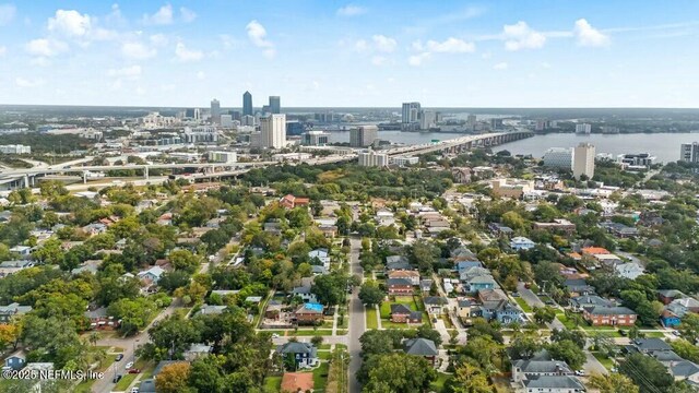 drone / aerial view with a view of city and a water view