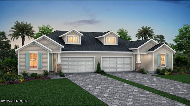 265 Dogleg Run, Saint Johns, FL 32259 - view of front of house featuring an attached garage, decorative driveway, and a front lawn