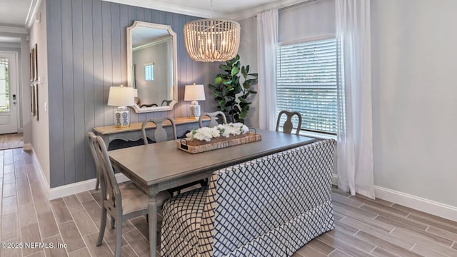 265 Dogleg Run, Saint Johns, FL 32259 - dining space with a chandelier, wood finish floors, and a healthy amount of sunlight