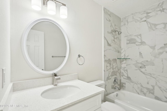 full bath featuring vanity, shower / bathing tub combination, and toilet