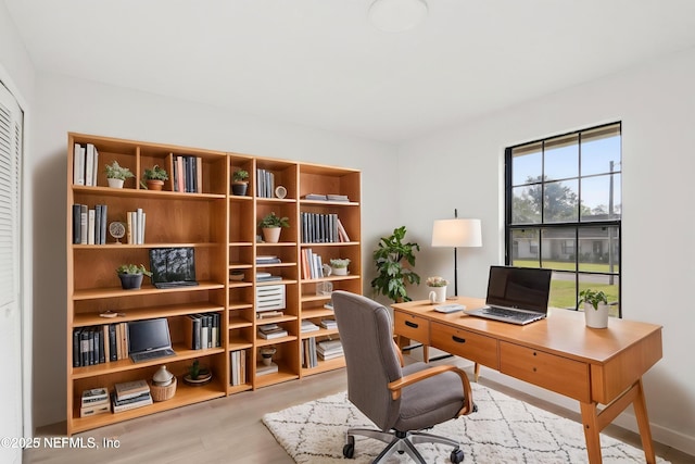 office space with wood finished floors
