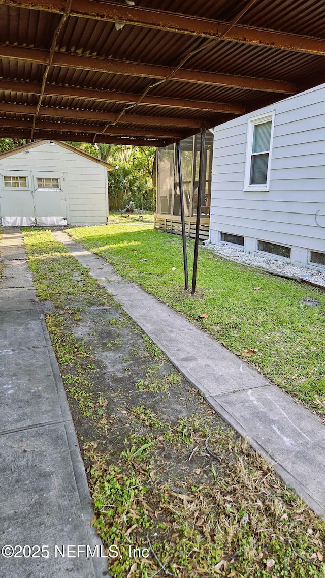 4916 Dundee Rd, Jacksonville, FL 32210 - view of yard with an outdoor structure