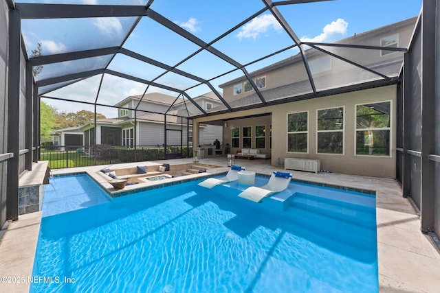 view of swimming pool with a jacuzzi, a fenced in pool, an outdoor living space, a patio, and glass enclosure