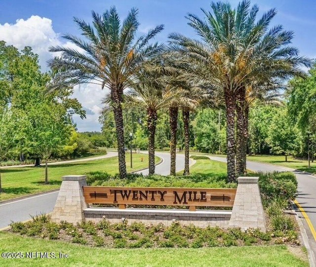 view of community with a yard
