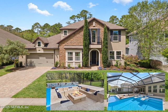 exterior space with driveway, an outdoor pool, a balcony, stone siding, and stucco siding