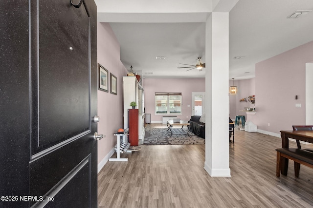 11975 Smith Pointe Ct, Jacksonville, FL 32218 - foyer entrance with visible vents, ceiling fan, baseboards, and wood finished floors