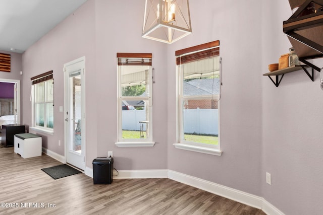 11975 Smith Pointe Ct, Jacksonville, FL 32218 - entryway featuring baseboards and wood finished floors