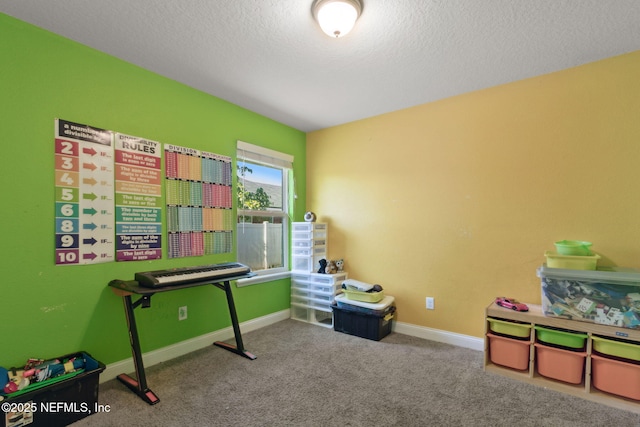 11975 Smith Pointe Ct, Jacksonville, FL 32218 - recreation room with baseboards, carpet, and a textured ceiling