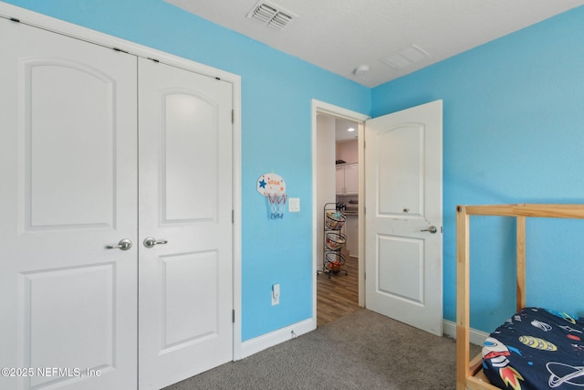 11975 Smith Pointe Ct, Jacksonville, FL 32218 - carpeted bedroom with visible vents and baseboards