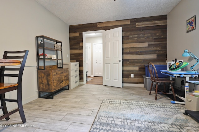 3038 Majestic Oaks Ln, Green Cove Springs, FL 32043 - home office featuring wooden walls, baseboards, wood finish floors, and a textured ceiling