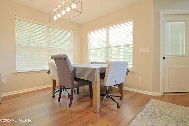 3038 Majestic Oaks Ln, Green Cove Springs, FL 32043 - dining area with baseboards and wood finished floors